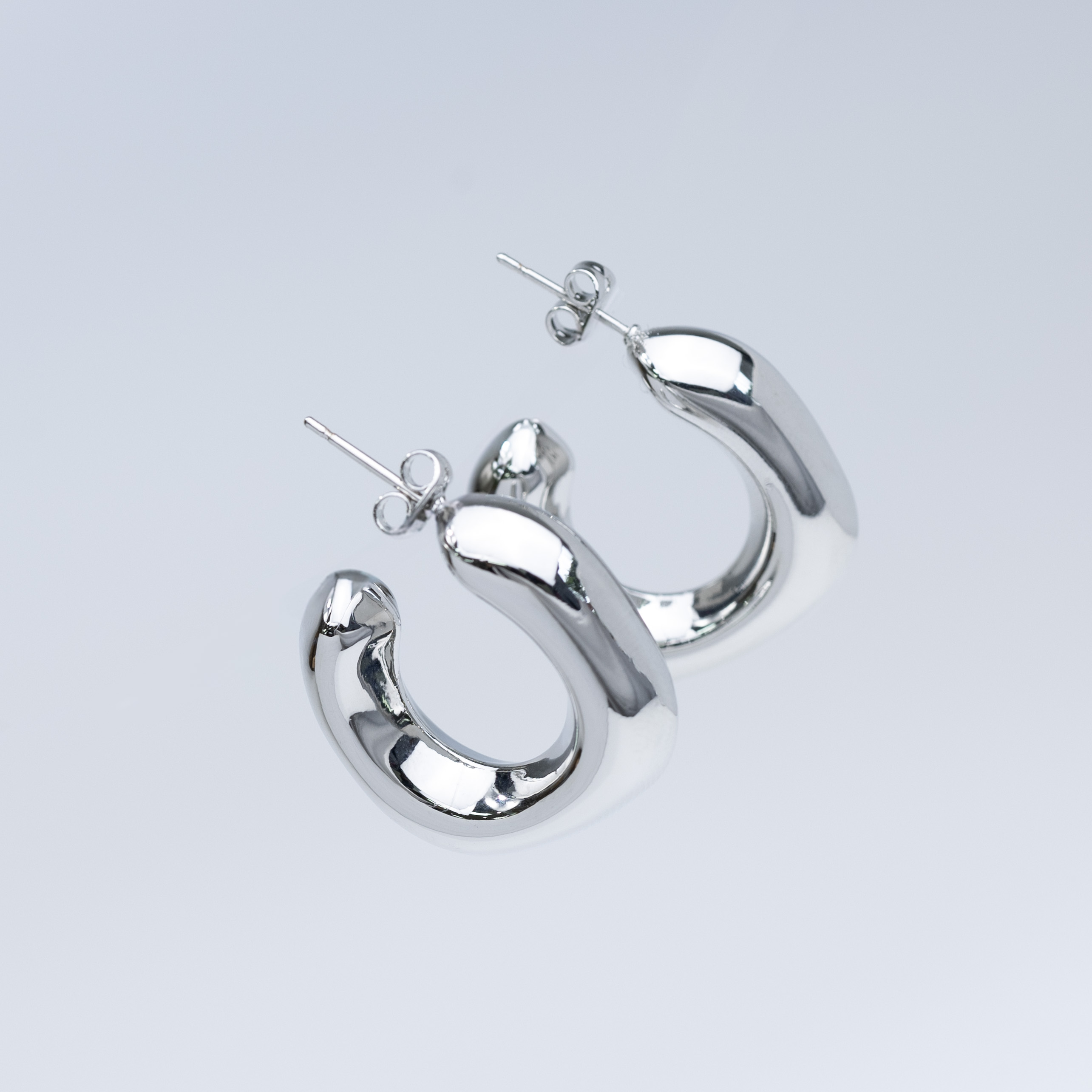 19729 Silver Puffy Square Earrings